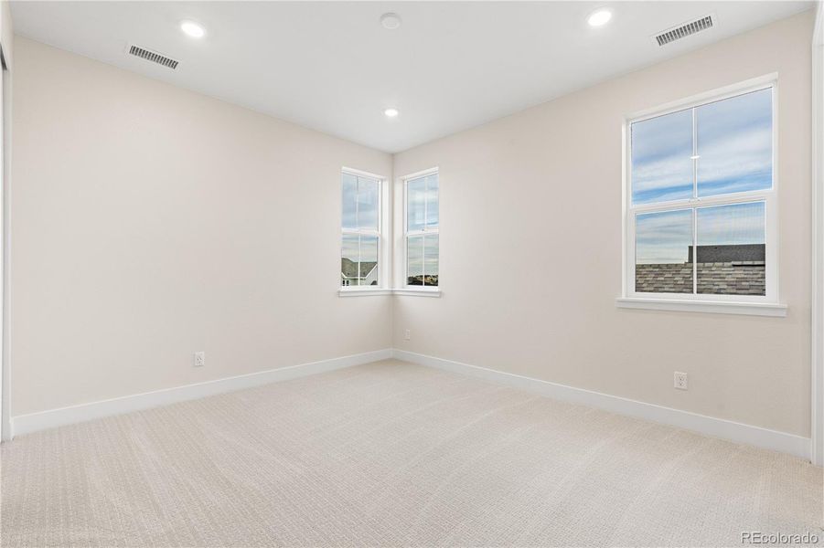 Spacious, unfurnished interior of a new home in Luxe at The Canyons, Castle Pines (Image 40).