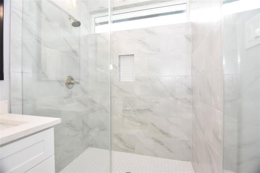 Primary bath with large walk in shower