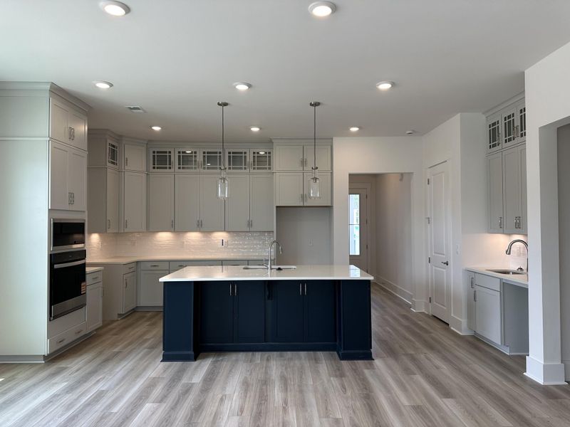 Furnished interior view inside a new home in Summerwind Crossing at Lakes of Cane Bay, Summerville (Image 3).