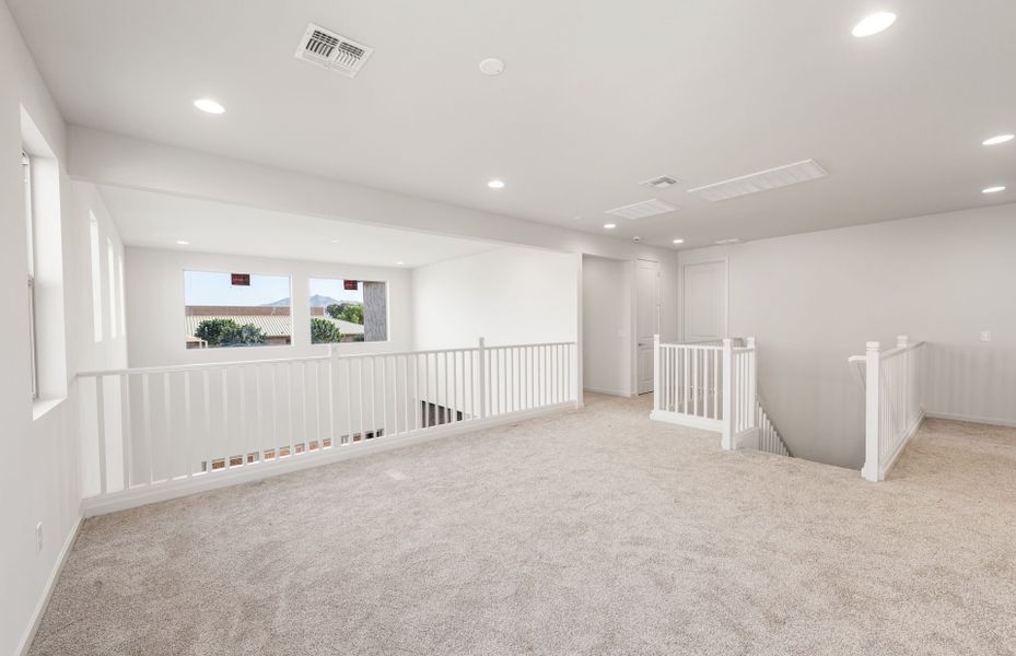 Spacious, unfurnished interior of a new home in Legado West, Queen Creek (Image 30).
