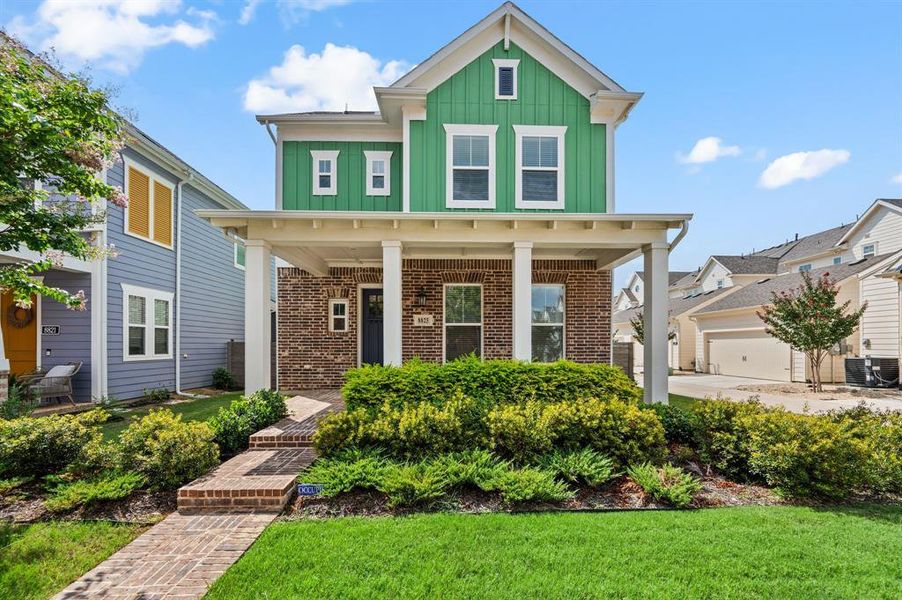 Front exterior of a new home in HomeTown Garden, North Richland Hills, TX, highlighting curb appeal (Image 1). Front exterior of a new home in HomeTown Garden, North Richland Hills, TX, highlighting curb appeal (Image 1).