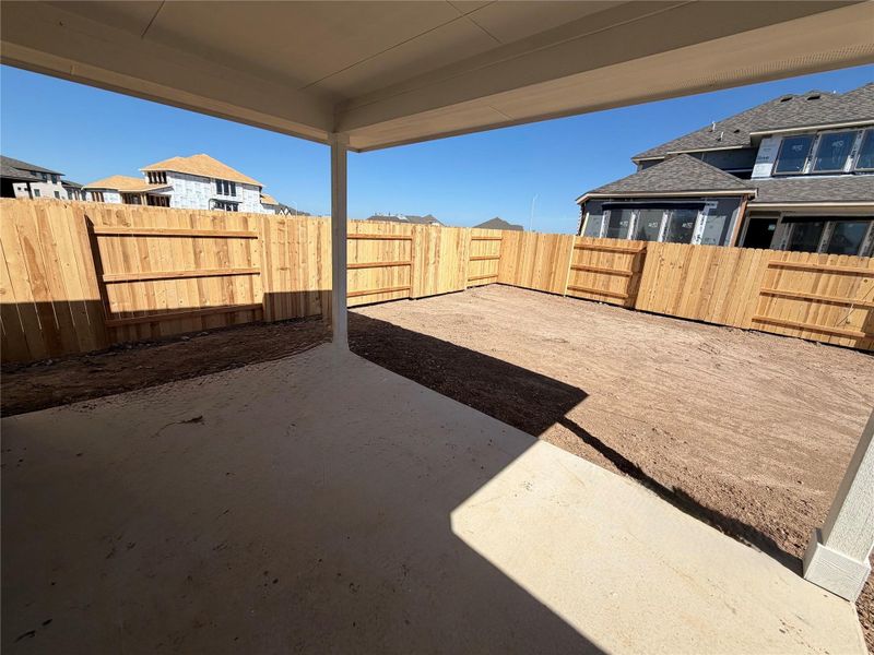 Exterior details and patio area of a home in Lariat, Liberty Hill (Image 12).