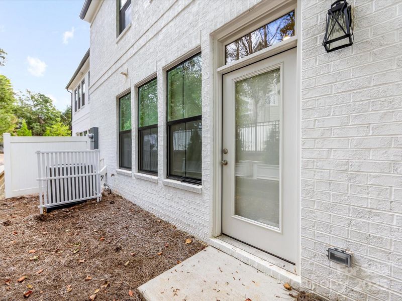 Exterior details and patio area of a home in Towns at Rea Colony, Charlotte (Image 4).