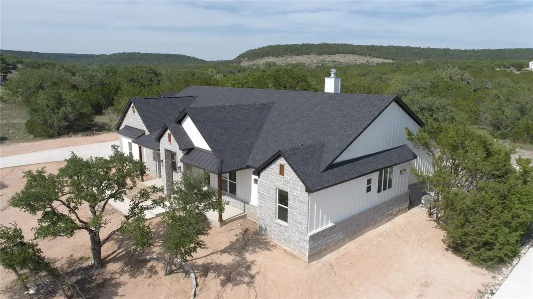 View of subject property with a heavily wooded area View of subject property with a heavily wooded area