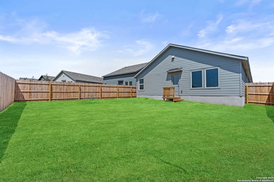 Exterior details and patio area of a home in Lodi Grove, Floresville (Image 2). Exterior details and patio area of a home in Lodi Grove, Floresville (Image 2).
