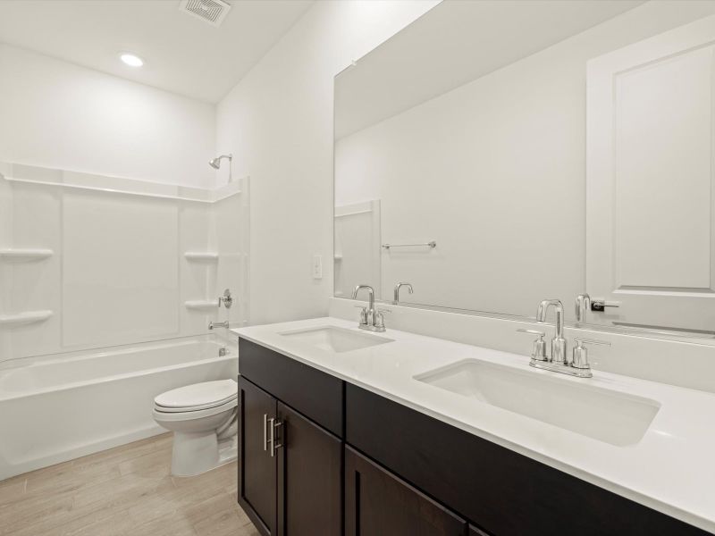 Furnished interior view inside a new home in Rancho Mirage Signature Series, Maricopa (Image 5).
