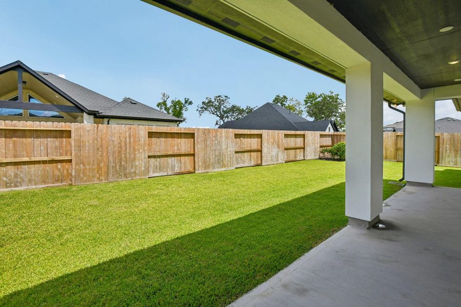Exterior details and patio area of a home in Sienna 65', Missouri City (Image 27).