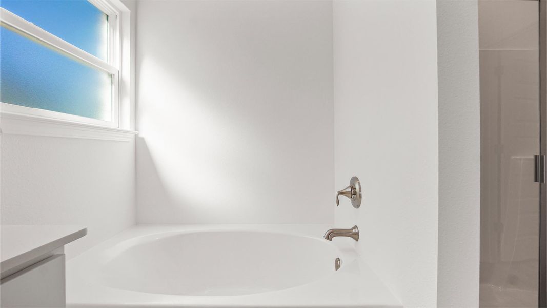 Representative furnished interior of a home built from the Madison by D.R. Horton in Owl's Head Farms, Freeport (Image 13).