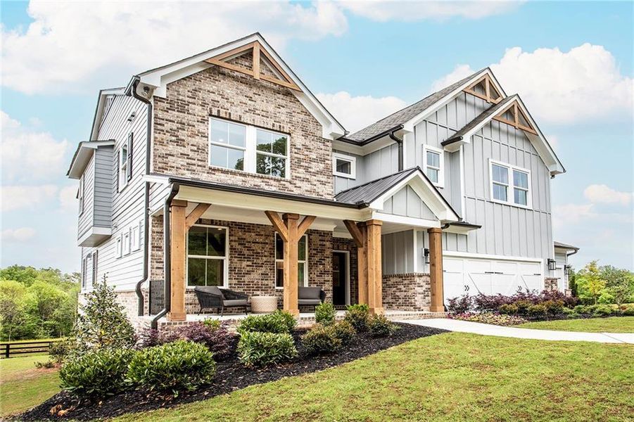 Front exterior of a new home in Hopewell Reserve, Cumming, GA, highlighting curb appeal (Image 21). Front exterior of a new home in Hopewell Reserve, Cumming, GA, highlighting curb appeal (Image 21).