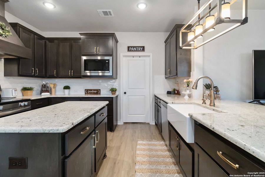 Furnished interior view inside a new home in , Devine (Image 16). Furnished interior view inside a new home in , Devine (Image 16).