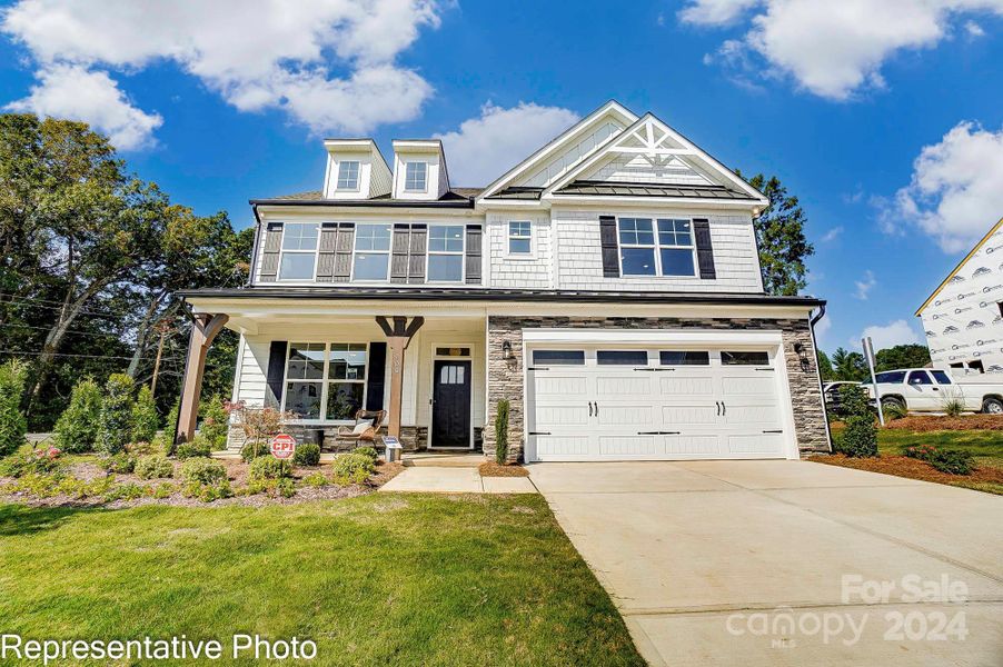 Homesite 609 features a Davidson floorplan with front-load garage.