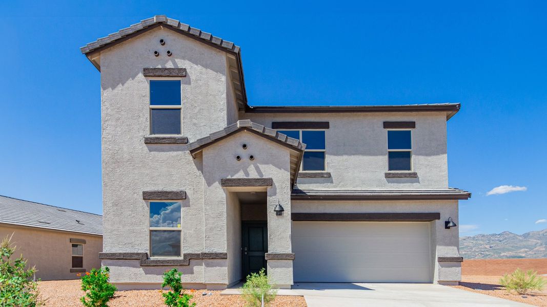 Representative exterior photo of a completed home built from the River by D.R. Horton in The Oasis at Rocking K, Vail, AZ (Image 15).