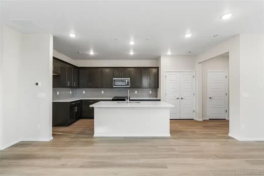 Furnished interior view inside a new home in Barefoot Village, Firestone (Image 6).