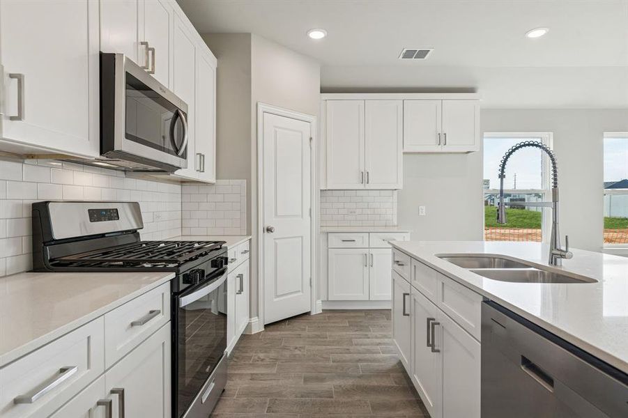 Furnished interior view inside a new home in Venetian, Weston (Image 5).
