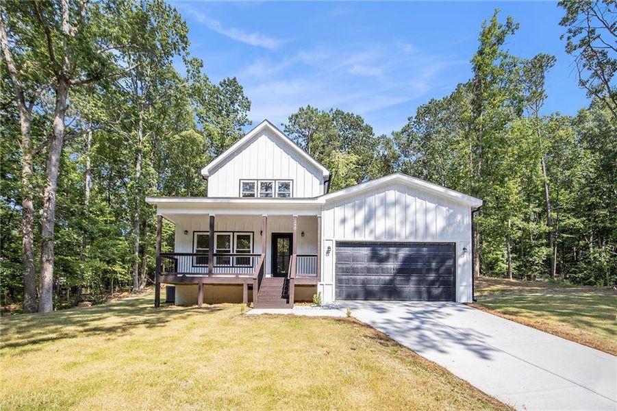 Front exterior of a new home in , Villa Rica, GA, highlighting curb appeal (Image 14).