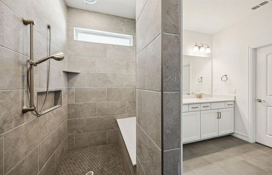 Deep walk in shower in owner's suite *Real home pictured Deep walk in shower in owner's suite *Real home pictured