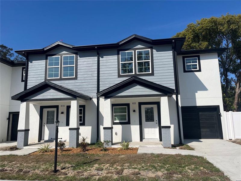 Front exterior of a new home in , Tampa, FL, highlighting curb appeal (Image 2). Front exterior of a new home in , Tampa, FL, highlighting curb appeal (Image 2).