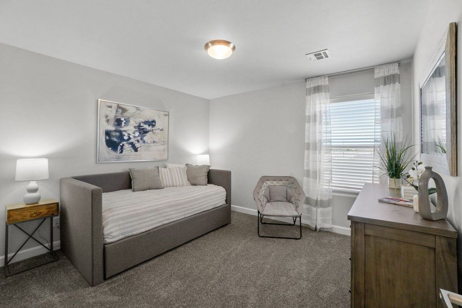 Representative furnished interior of a home built from the Capitan by Hakes Brothers in Hillside Park, El Paso (Image 11).