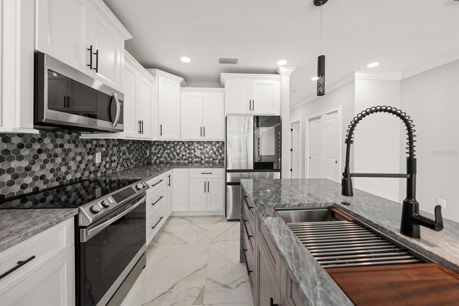 Furnished interior view inside a new home in , Clearwater (Image 9). Furnished interior view inside a new home in , Clearwater (Image 9).