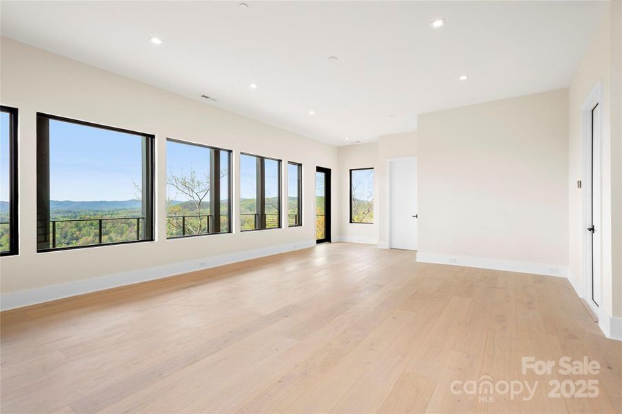 Family room leads to an expansive deck with gorgeous views