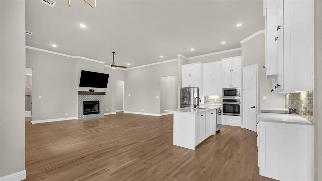 Furnished interior view inside a new home in Dry Creek East, Poolville (Image 17).
