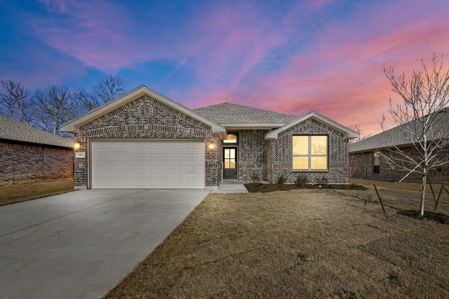 Representative exterior photo of a completed home built from the Cambria I by Cheldan Homes in Sunset Ridge, Keene, TX (Image 26). Representative exterior photo of a completed home built from the Cambria I by Cheldan Homes in Sunset Ridge, Keene, TX (Image 26).