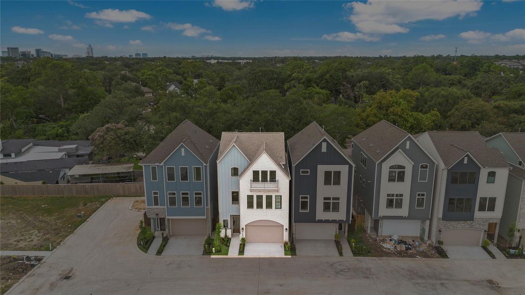 Front exterior of a new home in Spring Valley Creek, Houston, TX, highlighting curb appeal (Image 12). Front exterior of a new home in Spring Valley Creek, Houston, TX, highlighting curb appeal (Image 12).