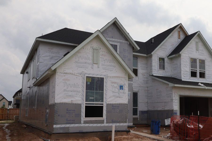 In-progress construction of a new home in Dunham Pointe, Cypress, TX (Image 19).