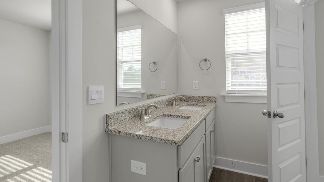 Furnished interior view inside a new home in The Palms at Indigo Preserve Townhomes, Leland (Image 11). Furnished interior view inside a new home in The Palms at Indigo Preserve Townhomes, Leland (Image 11).