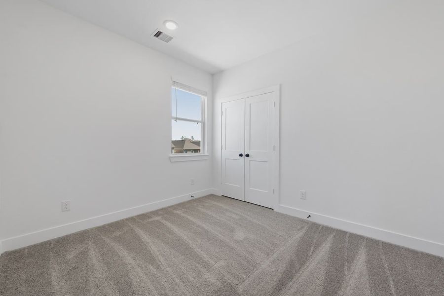 Representative unfurnished interior of a home built from the Dillon by Chesmar Homes in Sienna Courtyard, Missouri City (Image 34).