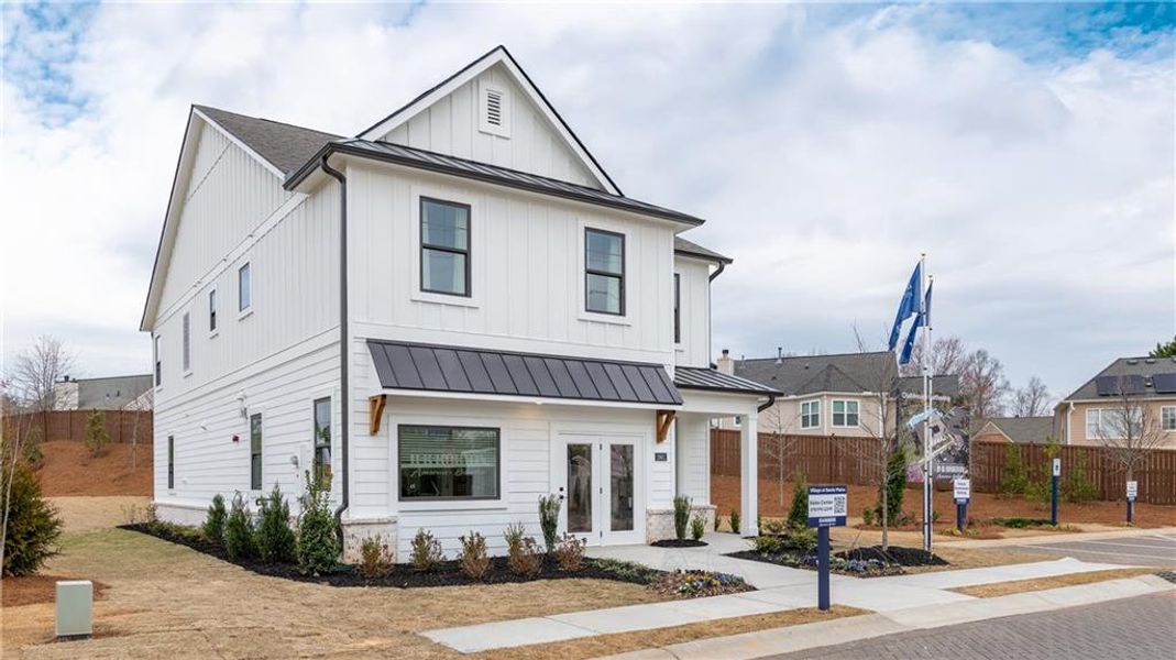 Front exterior of a new home in The Village at Sandy Plains, Marietta, GA, highlighting curb appeal (Image 25).