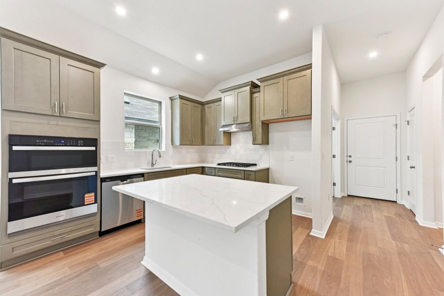 Furnished interior view inside a new home in Sage Hollow, Kyle (Image 4).