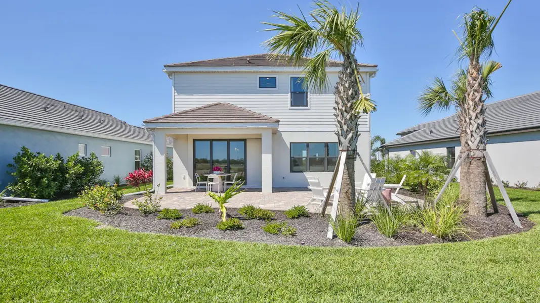 Exterior details and patio area of a home in Palm Grove, Lakewood Ranch (Image 2). Exterior details and patio area of a home in Palm Grove, Lakewood Ranch (Image 2).