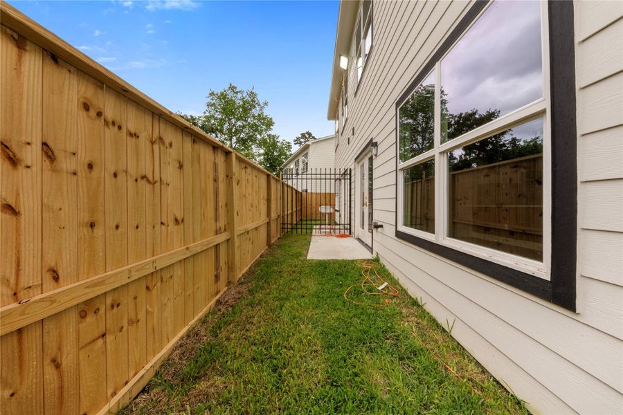 Exterior details and patio area of a home in , Houston (Image 3).