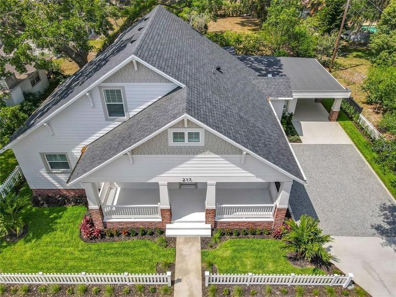 Front exterior of a new home in , Winter Garden, FL, highlighting curb appeal (Image 2). Front exterior of a new home in , Winter Garden, FL, highlighting curb appeal (Image 2).