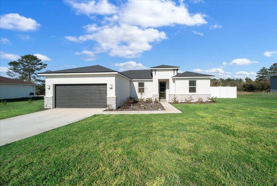Front exterior of a new home in Ocala, Ocala, FL, highlighting curb appeal (Image 30).