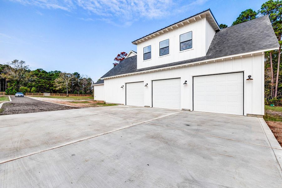 Front exterior of a new home in , Magnolia, TX, highlighting curb appeal (Image 27).