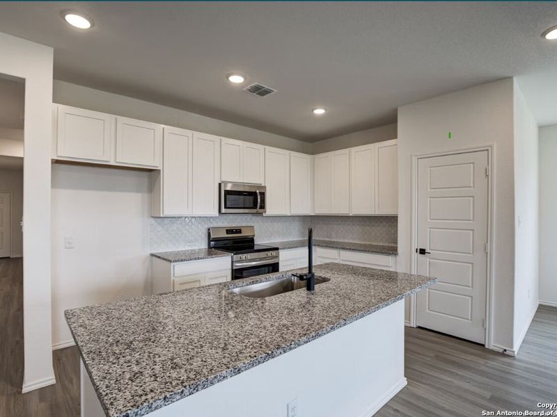 Furnished interior view inside a new home in Hannah Heights, Seguin (Image 4).