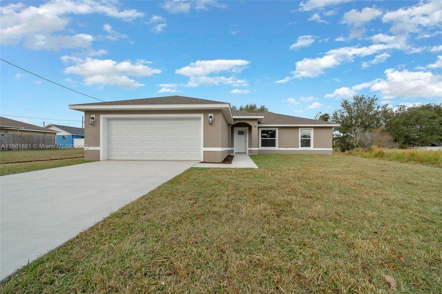 Front exterior of a new home in , Ocala, FL, highlighting curb appeal (Image 15).