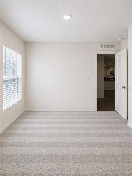 Spacious, unfurnished interior of a new home in Eagle Hammock, Eagle Lake (Image 35).