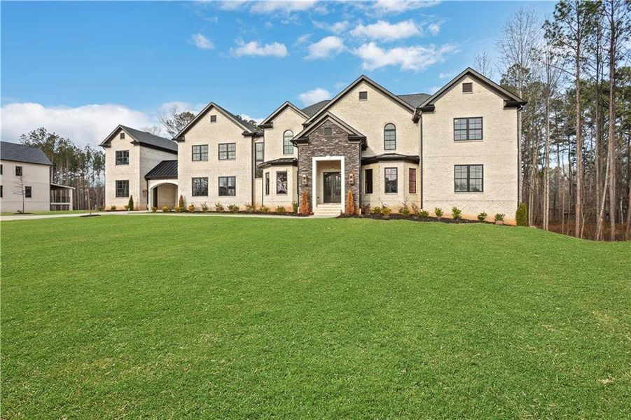 Front exterior of a new home in , Milton, GA, highlighting curb appeal (Image 34).