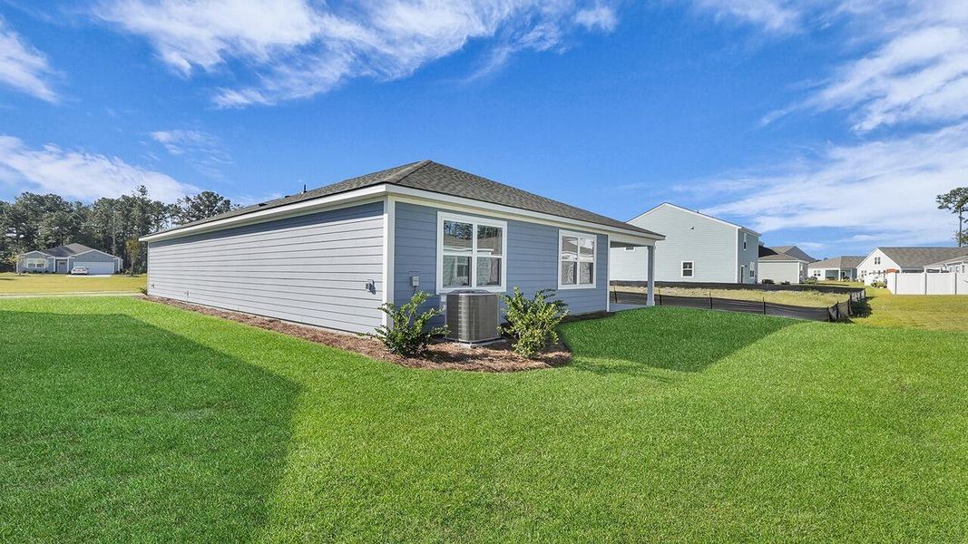 Exterior details and patio area of a home in Hillcrest, Ravenel (Image 18). Exterior details and patio area of a home in Hillcrest, Ravenel (Image 18).
