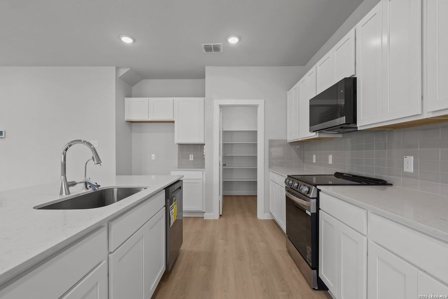 Furnished interior view inside a new home in Park Place, New Braunfels (Image 8).