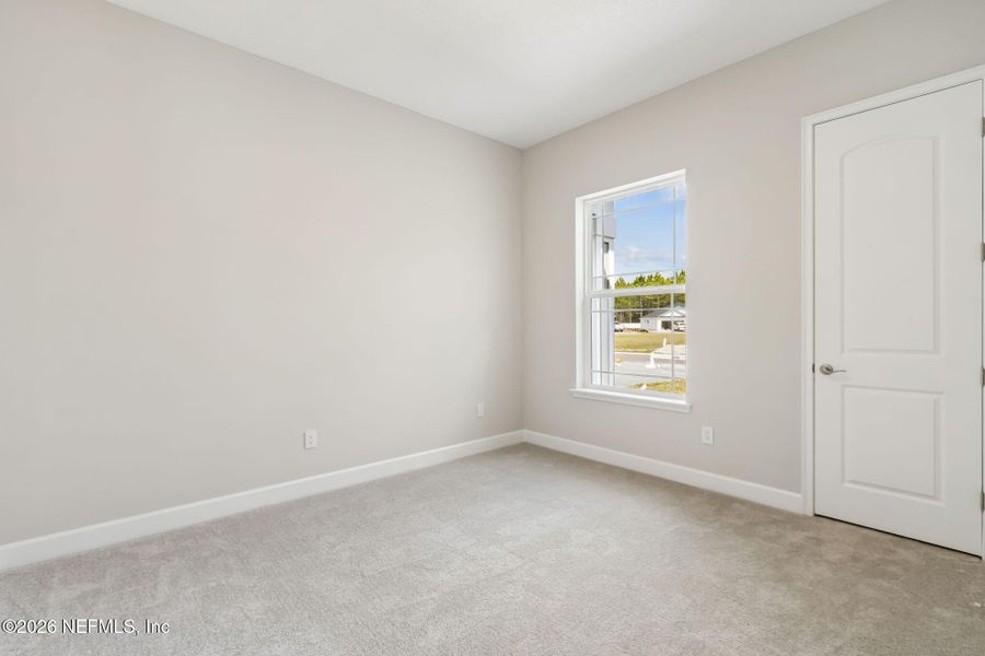 Spacious, unfurnished interior of a new home in Sandy Ridge, Yulee (Image 25).