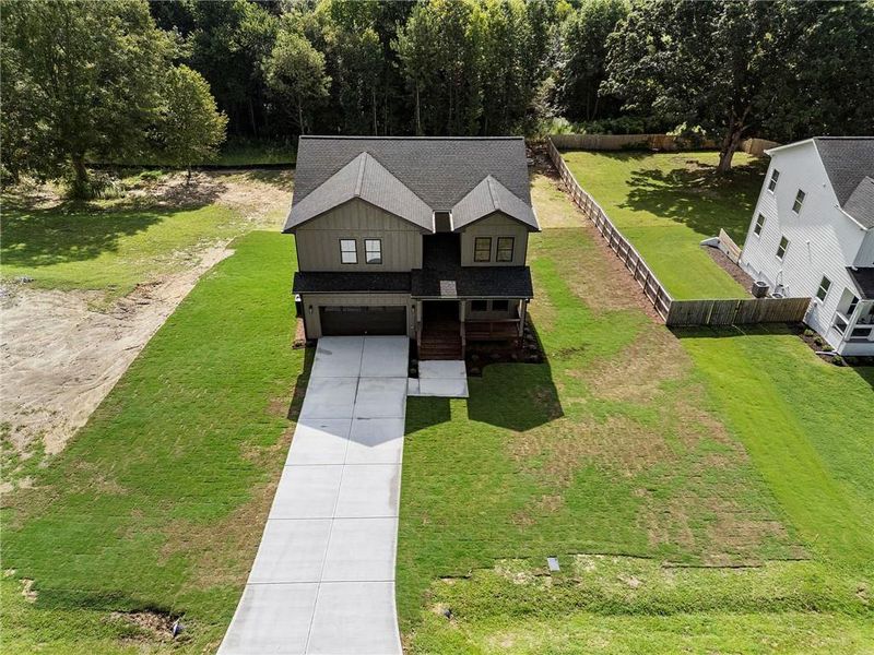 Front exterior of a new home in , Hiram, GA, highlighting curb appeal (Image 27).