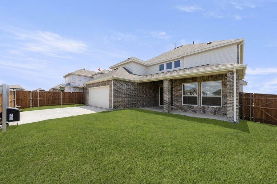 Exterior details and patio area of a home in Villages of Creekwood, Frisco (Image 3). Exterior details and patio area of a home in Villages of Creekwood, Frisco (Image 3).