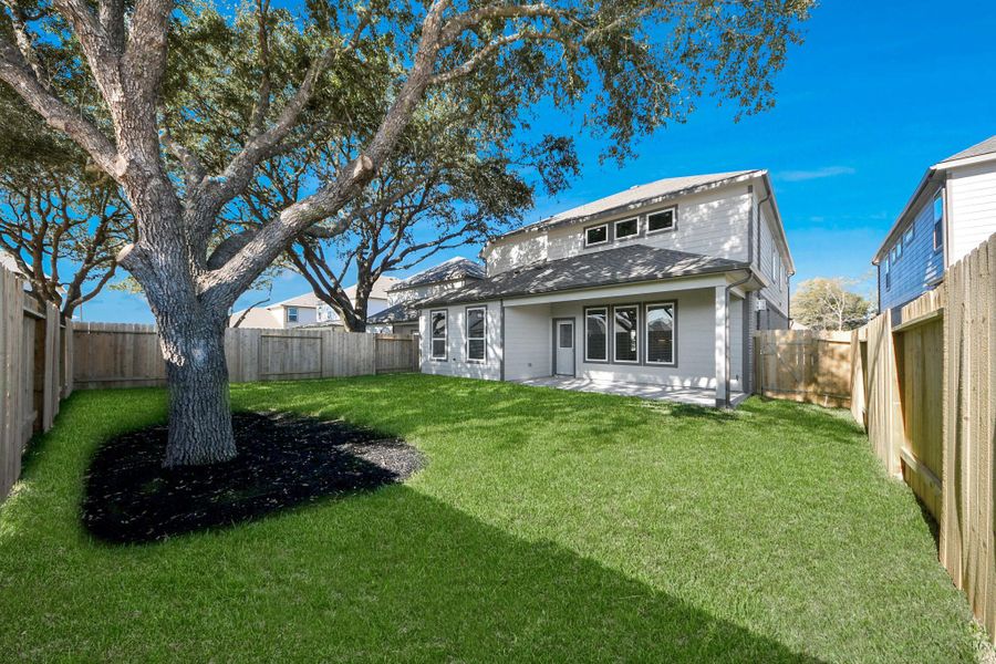 Come and see this spacious backyard with its beautiful covered patio. There is plenty of room for the kids to play and adults to relax. Perfect for your outdoor living space, patio furniture, bbq pit, and so much more. The possibilities are endless!