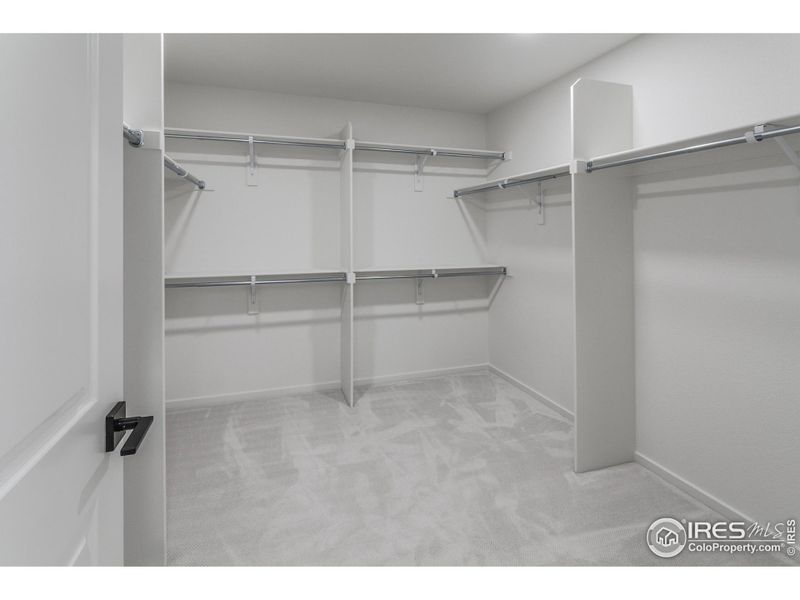 MASTER BEDROOM WALK IN CLOSET