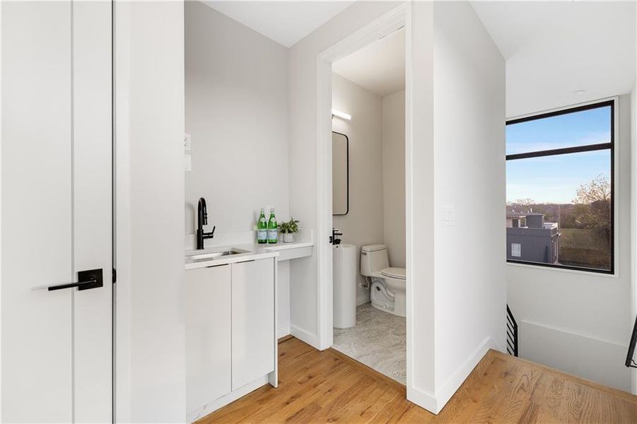 Furnished interior view inside a new home in Ten 5 Summerhill, Atlanta (Image 18).
