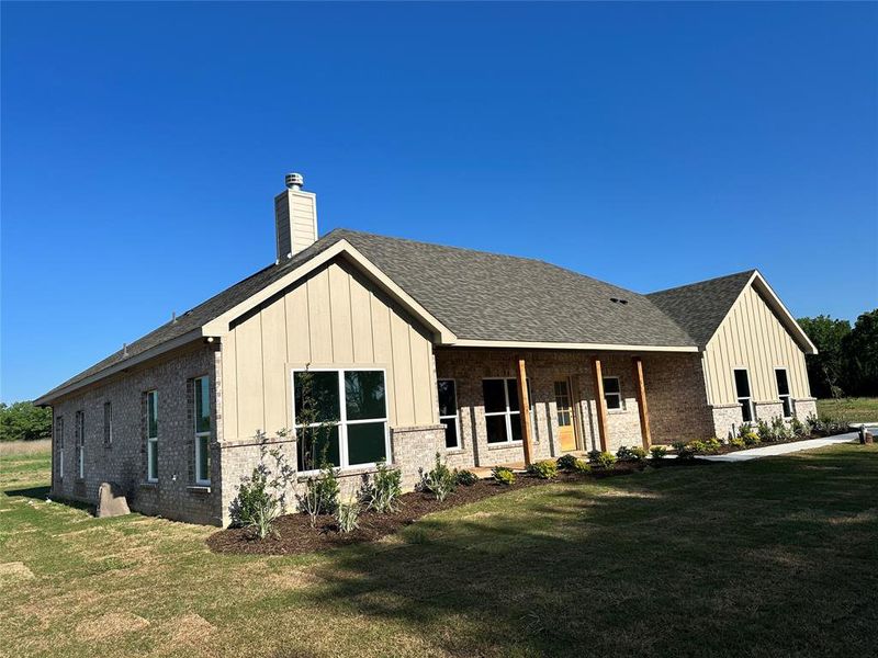 Front exterior of a new home in , Chico, TX, highlighting curb appeal (Image 1). Front exterior of a new home in , Chico, TX, highlighting curb appeal (Image 1).
